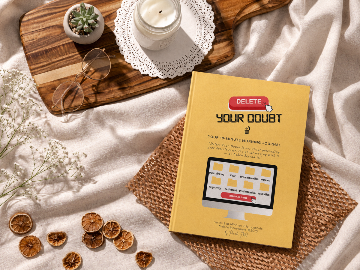 Delete Your Doubt physical journal in a warm landscape flat lay
